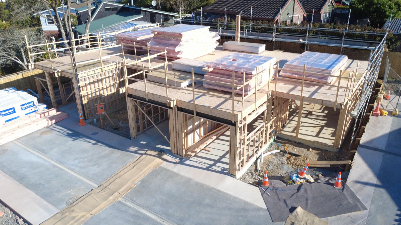 Upper-floor decks with delivered frames above the installed ground-floor framing · October 2026